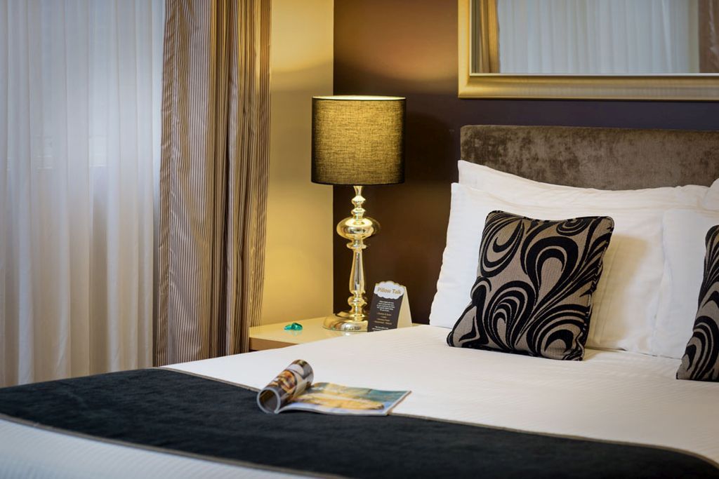 Treasury on Collins Hotel